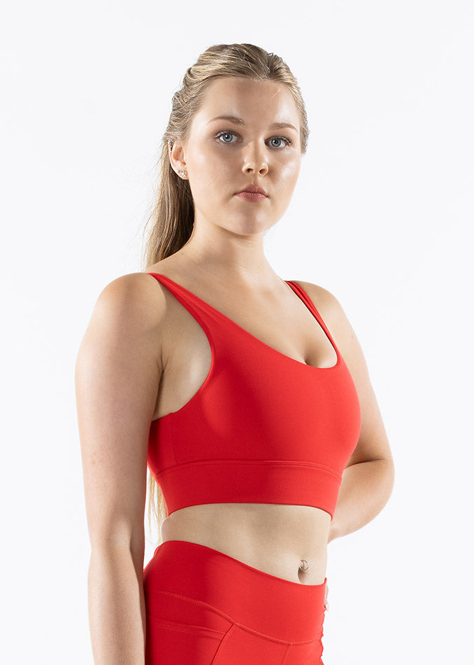 
                  
                    Right side view of red Venatrix Eva sports bra showcasing sleek design and supportive fit for active lifestyles.
                  
                