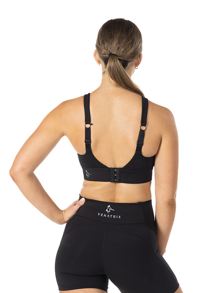 
                  
                    Back view of black Venatrix Performance racerback sports bra showing supportive design for active wear.
                  
                