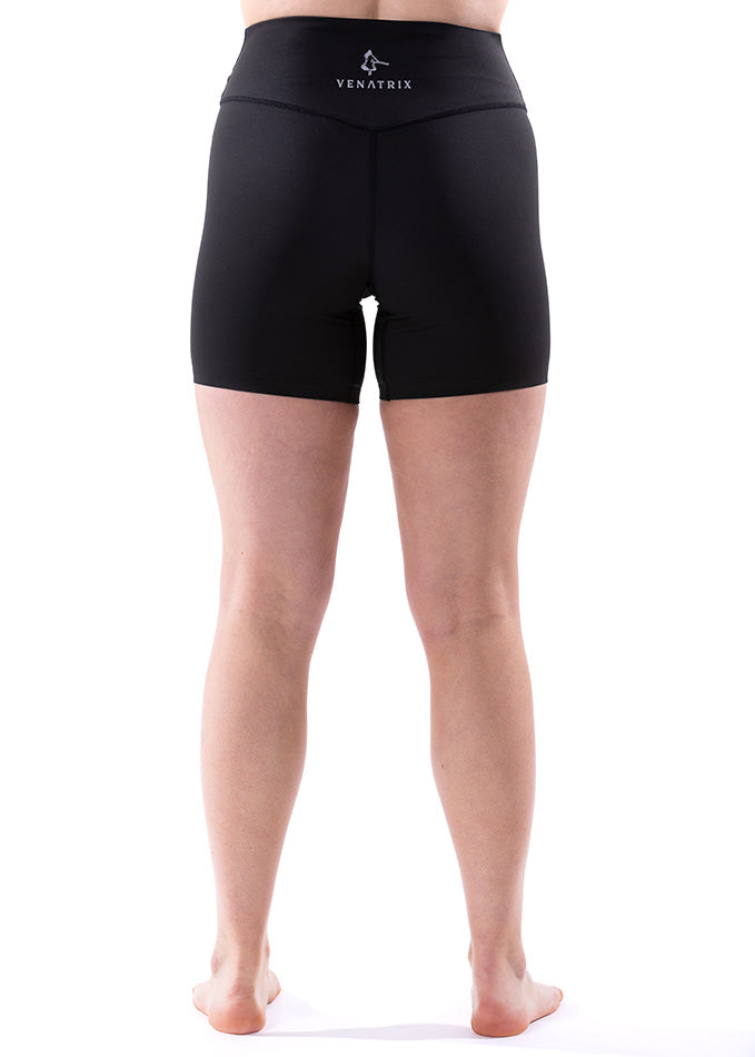 
                  
                    Back view of Rhythm black shorts for women, featuring a streamlined design and comfortable cycling fit.
                  
                