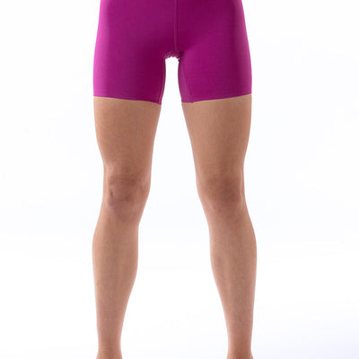 Front view of Rhythm pink bike shorts for girls, showcasing a sleek design and comfortable athletic fit.