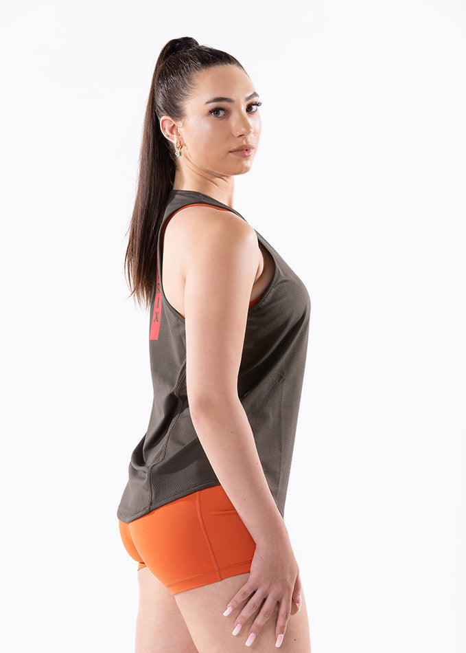 
                  
                    Right-side view of an olive green singlet for women, emphasizing its comfortable fit and modern workout design.
                  
                